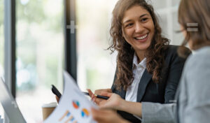 Woman working on accounting policies and procedures guide for firm